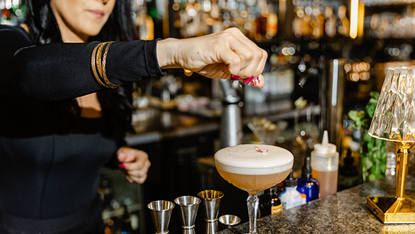 Making a drink at the bar